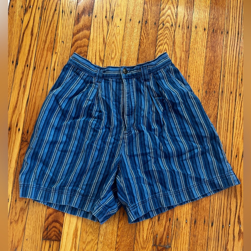 Liz wear striped blue shorts